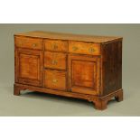 An antique elm dresser,