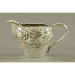 A Japanese silver cream jug,