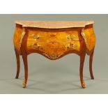 A Louis XV style walnut veneered commode, two drawer, with variegated marble top,