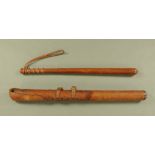 A vintage mounted Policeman's truncheon, in leather spring loaded case. Length 61 cm.