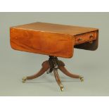 A 19th century mahogany pedestal Pembroke table,