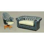 A Victorian style Chesterfield two seater settee with matching revolving easy chair.