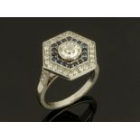 An Art Deco style diamond and sapphire ring, the centre diamond +/- 0.80 carats.