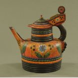 A Hungarian painted wooden wine vessel, circa 1900. Height 38 cm, width 36 cm.