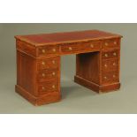 A late Victorian/Edwardian oak pedestal desk,