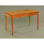 A 19th century pine serving table, the plain top with rounded corners on square tapered legs.