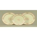 Three matching late 18th century Chinese enamelled armorial porcelain oval meat plates,