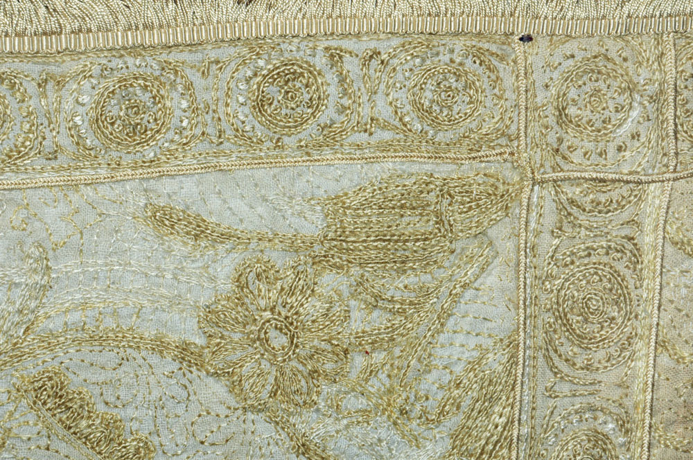 WITHDRAWN - A cream and gilt thread embroidered and fringed bedspread, with figures, - Image 14 of 19