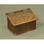 A 19th century carved slope front box. Width 39 cm.