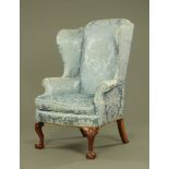 A Queen Anne Style wing armchair,