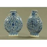 A pair of 19th century blue and white Chinese Pilgrim flasks. Height 26 cm, width 19.