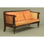 A 19th century mahogany framed bergere settee,