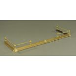 A brass fire kerb with rope twist corner rails. Internal dimensions 153 cm x 46 cm.