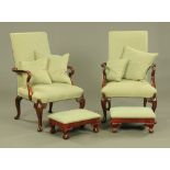 A pair of Gainsborough style open armchairs,