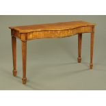 A George III mahogany serpentine fronted serving table,