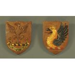 Two carved oak shield crests,