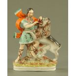 A 19th century Staffordshire figure, Hercules with Lion. Height 32 cm.