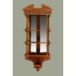 A late Victorian walnut hanging corner cabinet,