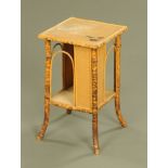 A late 19th/early 20th century bamboo two tier occasional table, with splayed legs.