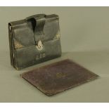 A silver mounted green leather writing case, together with a silver mounted blotter.
