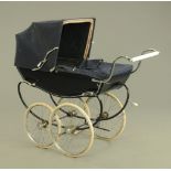 An early 20th century Silver Cross pram.