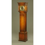 An oak grandmother clock,