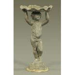 A lead putto figure bird bath. Height 70 cm, diameter 36 cm.