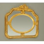 A gilt wood and composition framed mirror,