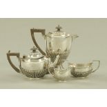A four piece silver bachelors tea and coffee service, Birmingham mark 1905, William Devonport,