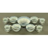 A Chinese porcelain "Rice" soup and tea service, comprising large bowl, four bowls, four tea bowls,