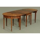 A 19th century mahogany dining table,