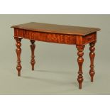 A Victorian mahogany serpentine fronted side table,