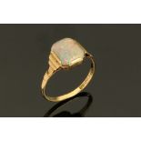 A 9 ct gold Art Deco opal ring, Size N, stone dimensions 10 mm x 8 mm.
