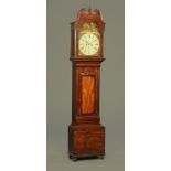 An early 19th century Scottish mahogany longcase clock with swans neck pediment above the arched