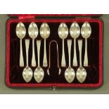 A cased set of ten silver teaspoons and tongs, Sheffield 1901.