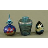 A Mtarfa glassblowers vase, an okra glass lidded vase and a Mdina glass egg paperweight.