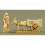 A Royal Dux donkey and cart, impressed 903 and with pink triangle mark to base.