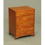 A mahogany chest of drawers, of small proportions,