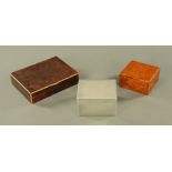 A WMF table cigarette box, width 11 cm, and two burrwood cigarette boxes.