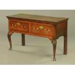 An antique oak dresser base,