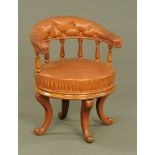 A Victorian mahogany revolving desk chair,