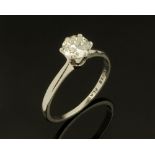 A platinum solitaire diamond ring, the brilliant cut diamond claw set, stamped L42 AWC & S Plat.