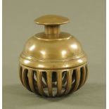 A 19th century Eastern bronze Temple bell. Height 14.5 cm, diameter 12.5 cm.