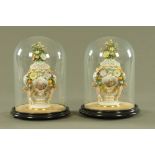 A pair of mid 19th century Meissen floral encrusted porcelain pot pourri vases and covers,