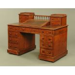 A Victorian mahogany "Dickens" desk,