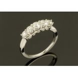 An 18 ct gold five stone diamond ring, Size N/O. Diamond weight +/- 1 carat.