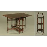An Edwardian mahogany three tier folding cake stand, together with a mahogany Sutherland table.