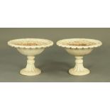 A pair of Victorian white painted cast iron shallow garden urns, diameter 54 cm,