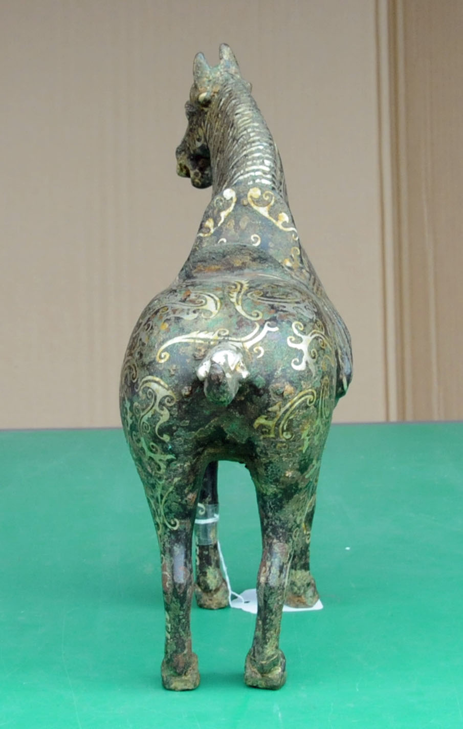 A Chinese bronze figure of a standing horse, with silver coloured metal inlay. Height 29. - Image 5 of 10