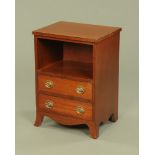 A mahogany bedside cabinet,